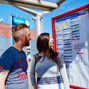 Couple looking at Bus Stop Timetable.jpg